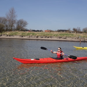 Kayak fun in shallow water by the Øhavets Smakkecenter